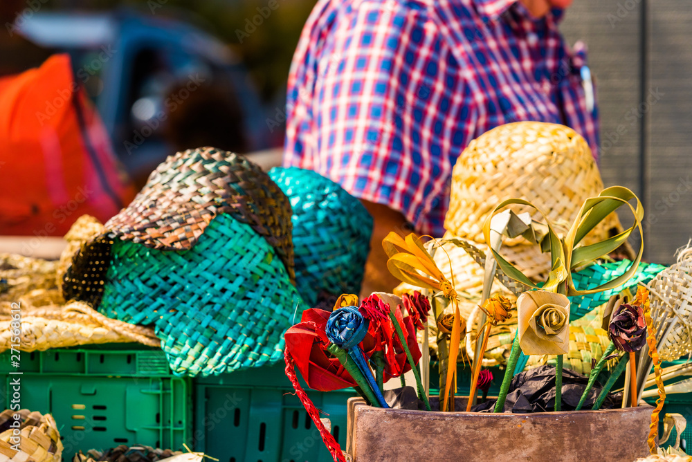 Wicker flowers and hats in the local market, Rarotonga, Aitutaki, Cook  Islands. With selective focus. Stock Photo | Adobe Stock