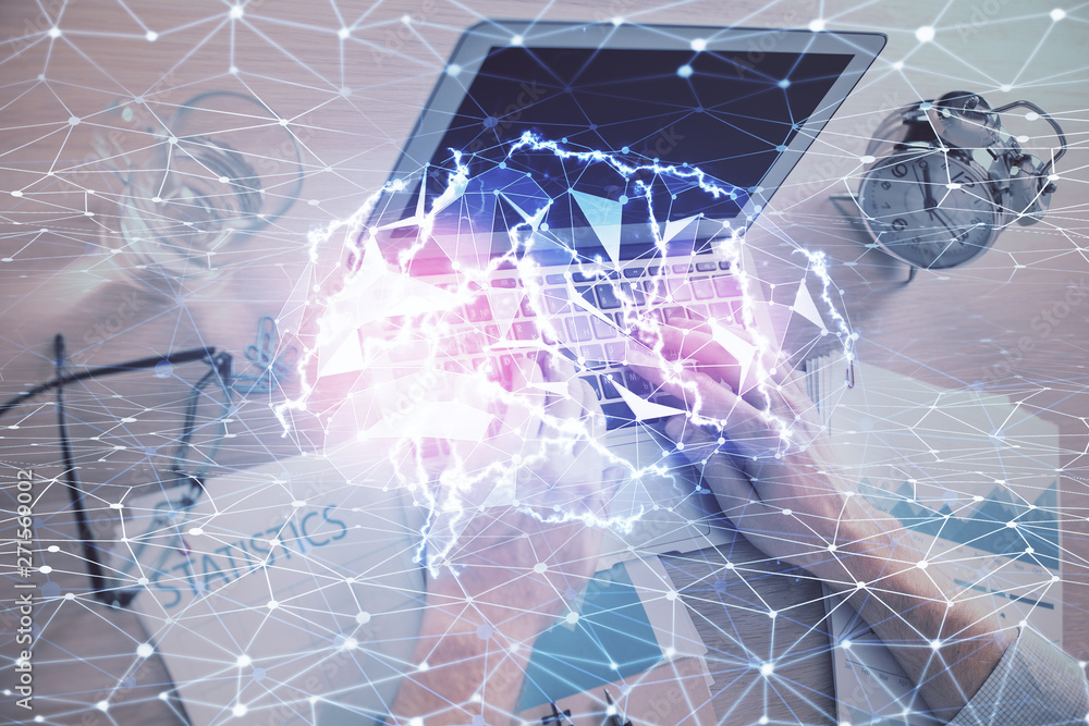 Man typing on keyboard background with brain hologram. Concept of big Data. Man typing on keyboard background with brain hologram. Concept of big Data.