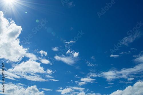 sun and white cloud with blue sky background