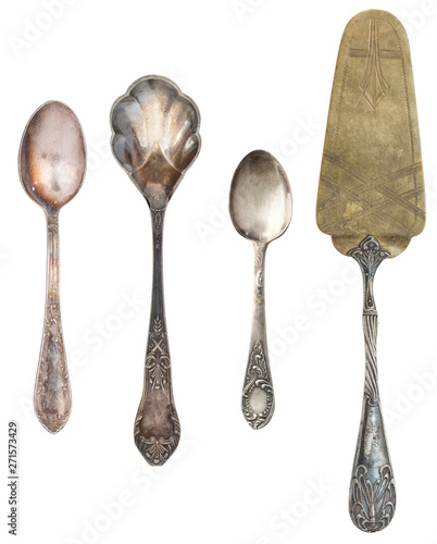 Vintage Antique silverware isolated on white background. Retro teaspoons, forks, knives, shovels for cake.