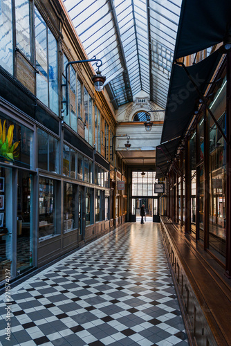 Canvas Print PARIS, FRANCE - APRIL 22, 2019: Covered Passage of Paris are an early form of sh