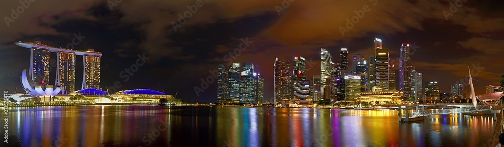 Singapore financial district skyline at Singapore Marina bay at night  
