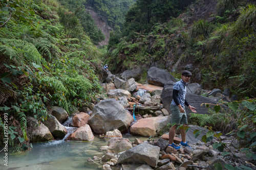 A young korean man is enjoying the beauty of Papandayan mountain. Papandayan Mountain is one of the favorite place to hike on Garut