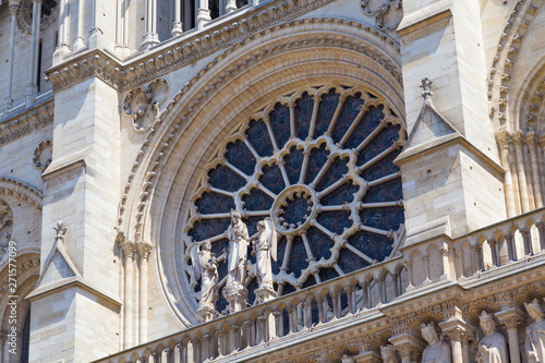 Rose window in the facade of the Notre-Dame de Paris (before the fire lit up in april 2019). Is a medieval cathedral and is considered to be one of the finest examples of French Gothic architecture.