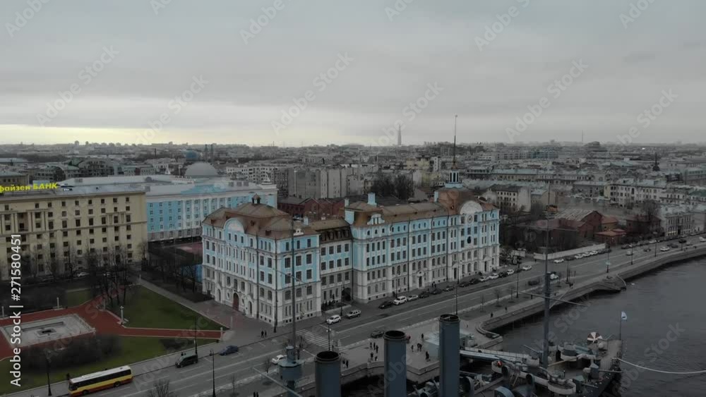 Aerial view in the central part of the city of Russia over the cruiser Aurora on the embankment of the Neva River in St. Petersburg Aerial view in the central part of the city of Russia over the cruiser Aurora on the embankment of the Neva River in St. Petersburg