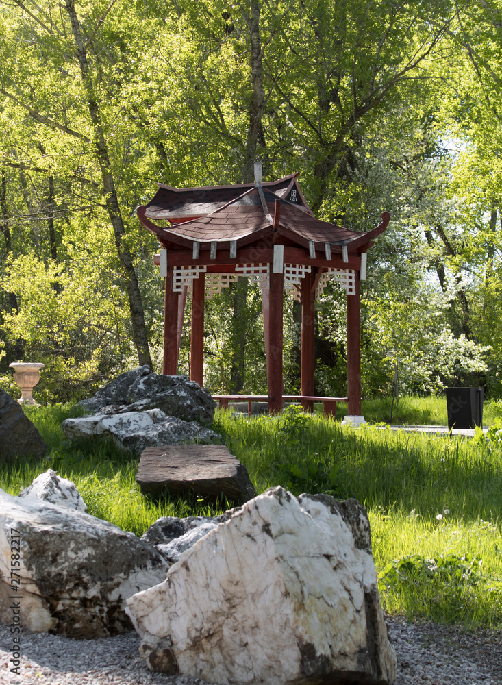Japanese gazebo. Park area. Nature background. Park landscape. Japanese gazebo. Park area. Nature background. Park landscape.