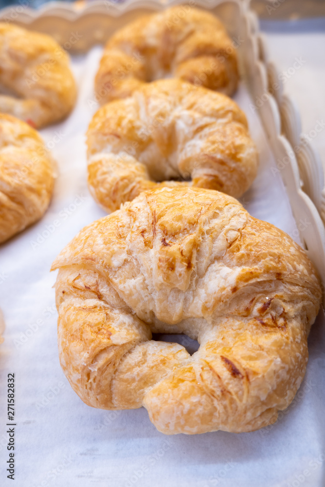 freshly baked croissants on baking tray - Close up freshly baked croissants on baking tray - Close up
