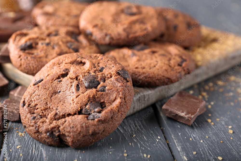 Fototapeta premium Tasty chocolate cookies on wooden background, closeup