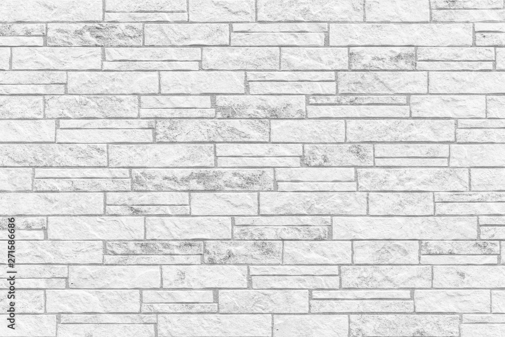 The modern white concrete tile wall background and texture The modern white concrete tile wall background and texture