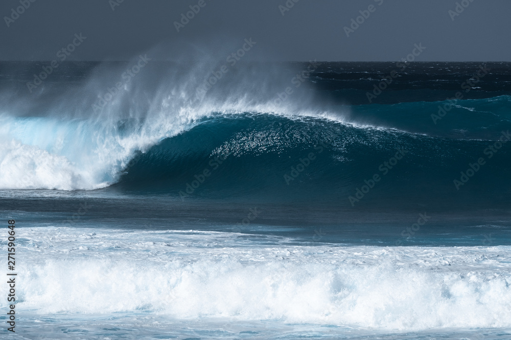 Perfectly shaped wave of the Banzai Pipeline surf spot located on the North Shore of Oahu, Hawaii