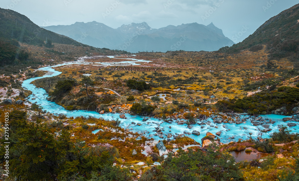 Rapid river with turquise water running in the valley named Valle de Lobos  in the Argentinean part of the Tierra del Fuego near the city of Ushuaia.  Stock Photo | Adobe Stock