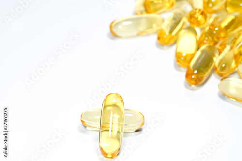 Fish oil capsule on isolated white background.