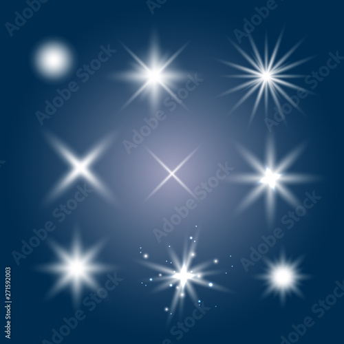 Glowing lights effect, flare, explosion and stars. Special effect isolated on blue background