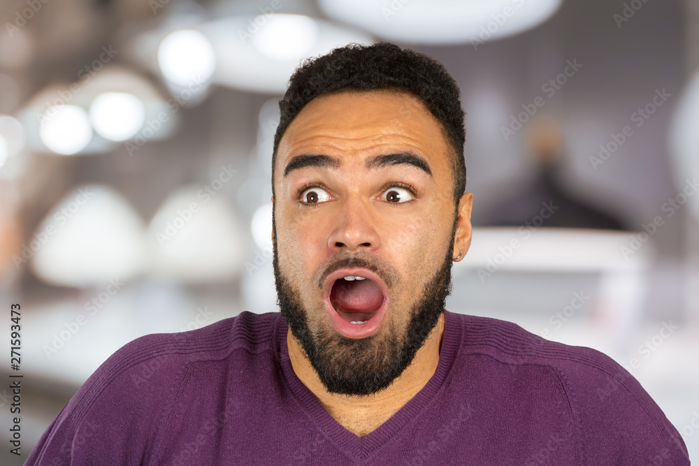 Black anxious stressed young man looking at camera Black anxious stressed young man looking at camera