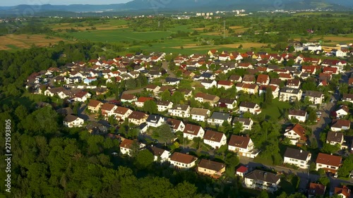 Aerial of  the village Kirchentellinsfurt in Schwaben Germany, with pan to the right from the woods to the city. photo