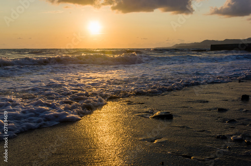 Amazing sea sunset, the sun, waves, clouds