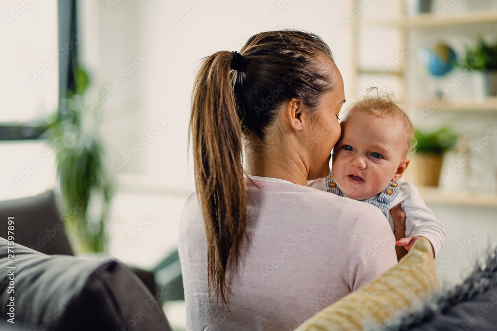 Loving mother and her baby boy at home. Loving mother and her baby boy at home.