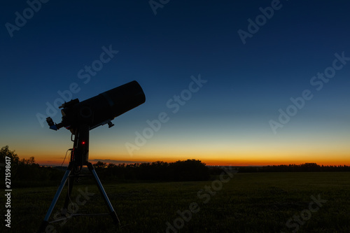 Telescope to study stars and planets is prepared for outdoor observations.