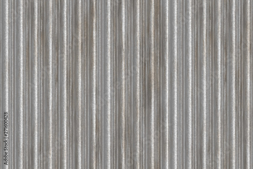 Metal sheet texture. Corrugated metal panel with rust. Old steel background