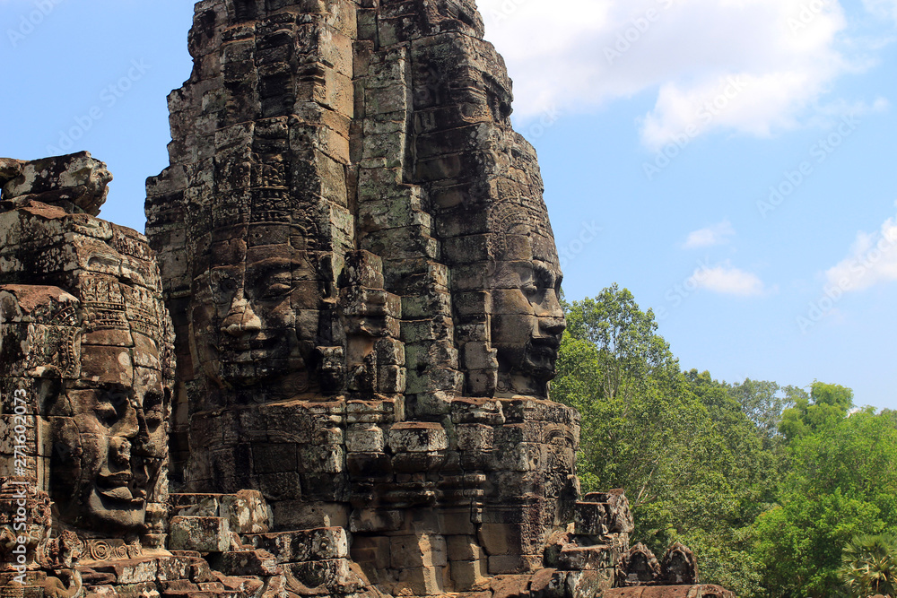 Ancient stone faces  of Bayon temple, Angkor Wat, Siam Reap, Cambodia