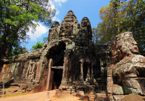 Ancient stone faces of gates on Bayon temple, Angkor Wat, Siam Reap, Cambodia