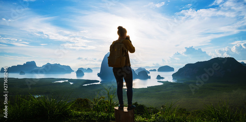 Female tourist photographers travel on the mountain. Landscape Beautiful Mountain on sea at Samet Nangshe Viewpoint. Phang Nga Bay ,Travel adventure, Travel Thailand, Tourist on summer holiday.