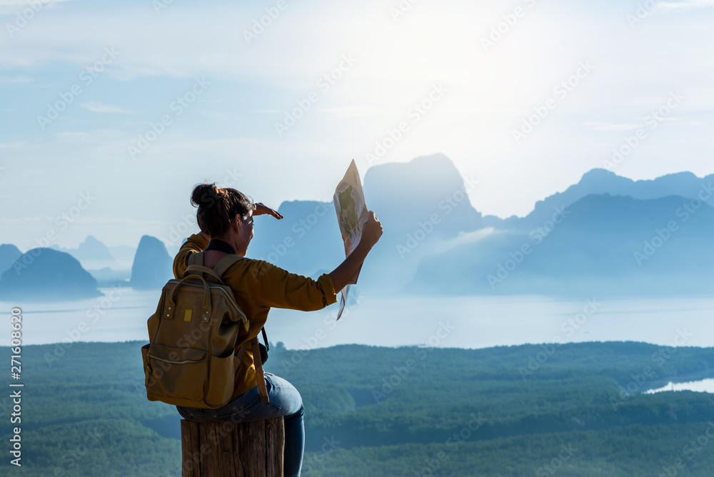 Travelers, young women are exploring the map. Landscape Beautiful Mountain on sea at Samet Nangshe Viewpoint. Phang Nga Bay ,Travel adventure, Travel Thailand, Tourist on summer holiday vacation. Travelers, young women are exploring the map. Landscape Beautiful Mountain on sea at Samet Nangshe Viewpoint. Phang Nga Bay ,Travel adventure, Travel Thailand, Tourist on summer holiday vacation.