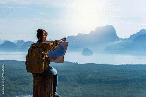 Travelers, young women are exploring the map. Landscape Beautiful Mountain on sea at Samet Nangshe Viewpoint. Phang Nga Bay ,Travel adventure, Travel Thailand, Tourist on summer holiday vacation.
