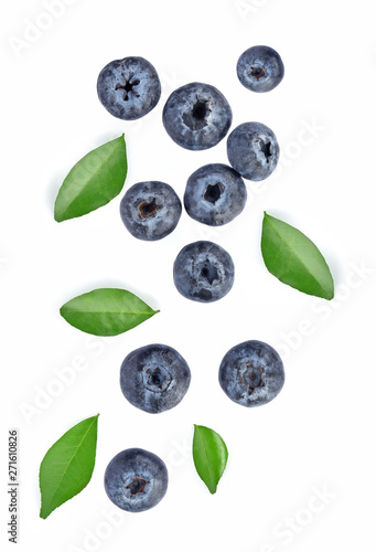 Blueberries with green leaves closeup, isolated on white background