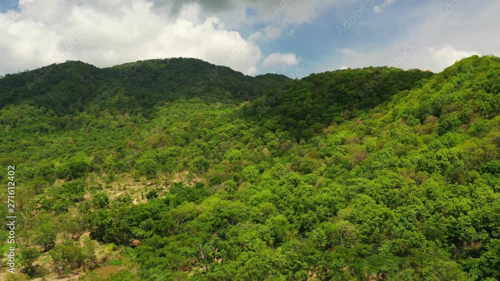 Aerial - Tropical mountains and clouds moving on the beautiful blue sky. Drone Shot. Natural timelaspe. 4k Resolution Aerial - Tropical mountains and clouds moving on the beautiful blue sky. Drone Shot. Natural timelaspe. 4k Resolution
