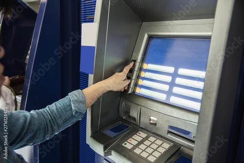 фотографія People waiting to get money from automated teller machine - people withdrawn mon
