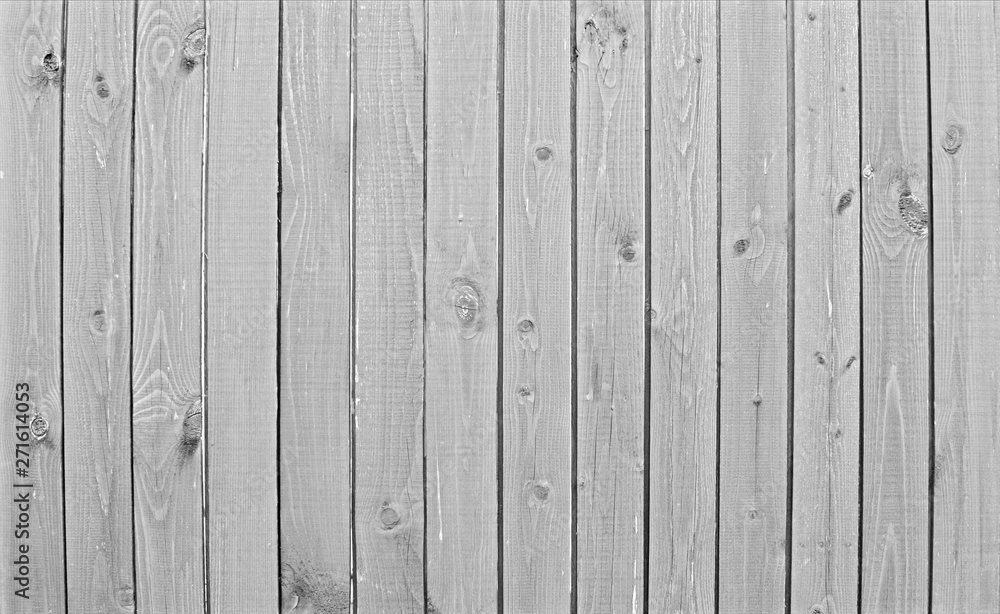 Natural wooden background. Surface of wooden texture for design and decoration. Shabby vertical boards with peeling paint. Gray color. Copy space. Natural wooden background. Surface of wooden texture for design and decoration. Shabby vertical boards with peeling paint. Gray color. Copy space.