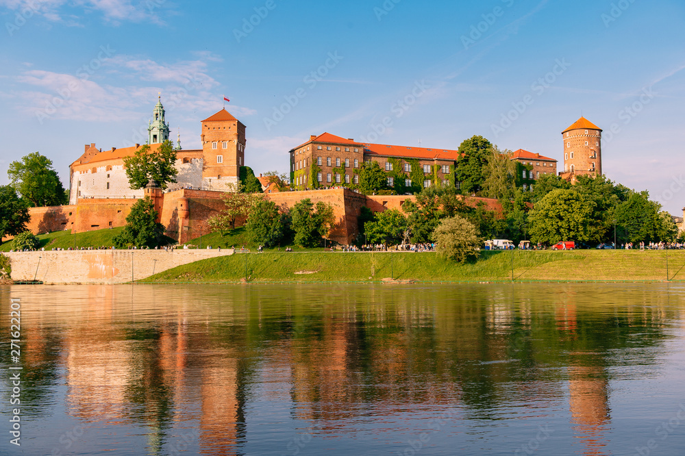  view at  Wawel castle in Krakow with reflections in water of Vistula (Wisla) river.
