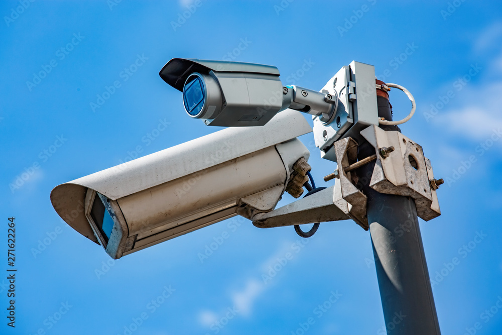 Double Security CCTV camera under blue sky Double Security CCTV camera under blue sky