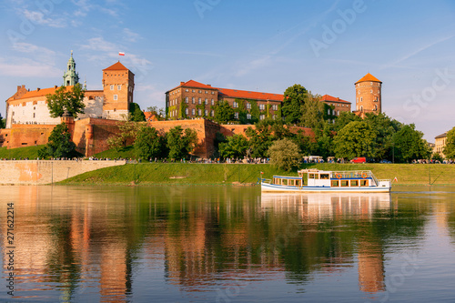  view at  Wawel castle in Krakow with reflections in water of Vistula (Wisla) river.