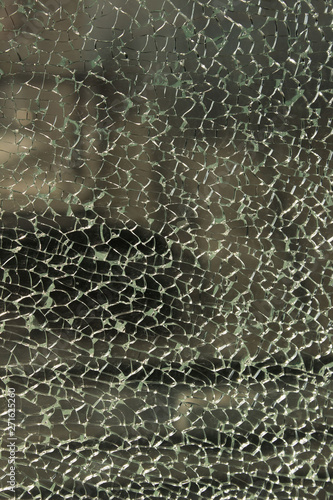 Blurred shot of broken glass. Broken window background. Abstract textures background.
