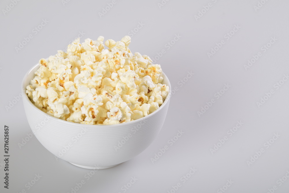Isolated Caramel popcorn in white bowl. Isolated Caramel popcorn in white bowl.