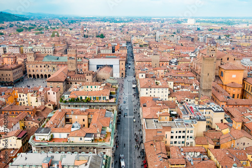 landscape of bologna during cloudy spring day in all its beauty with view of piazza maggiore and via rizzoli main street of historic center