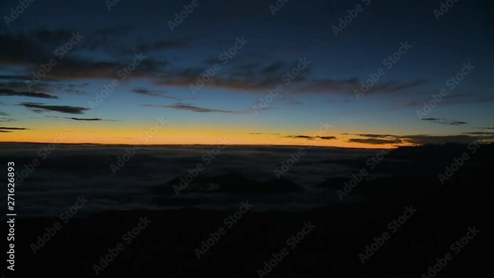 Wide still shot of fast motion sunset above Andes Mountains clouds, Andes, Peru Wide still shot of fast motion sunset above Andes Mountains clouds, Andes, Peru