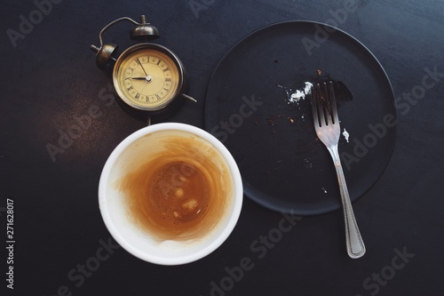 chockolate cake with alarm clock. photo