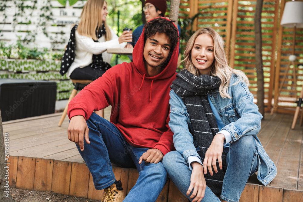 Happy young multhiethnic couple spending time