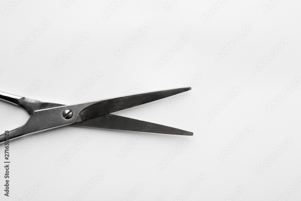 Pair of sharp scissors on white background Pair of sharp scissors on white background
