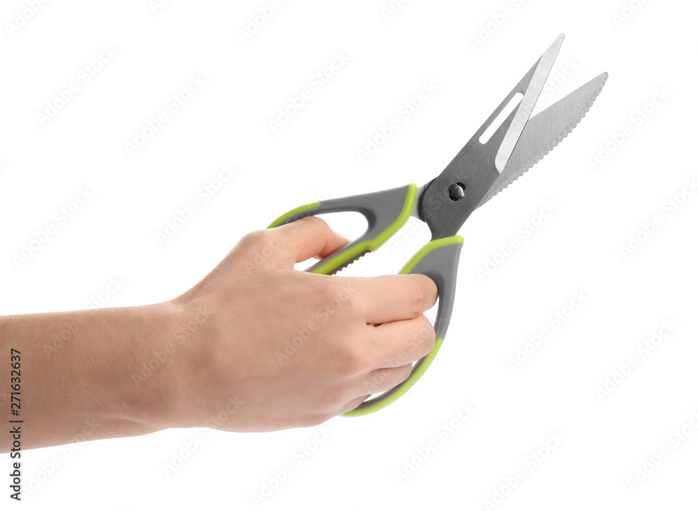 Woman holding kitchen scissors on white background, closeup Woman holding kitchen scissors on white background, closeup