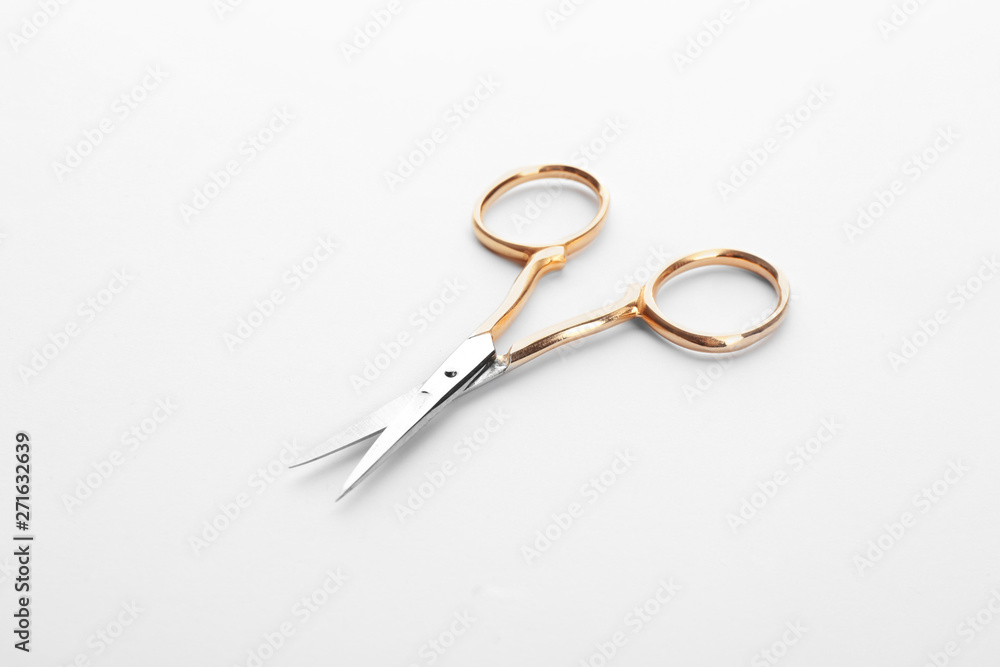 Pair of sharp sewing scissors on white background Pair of sharp sewing scissors on white background