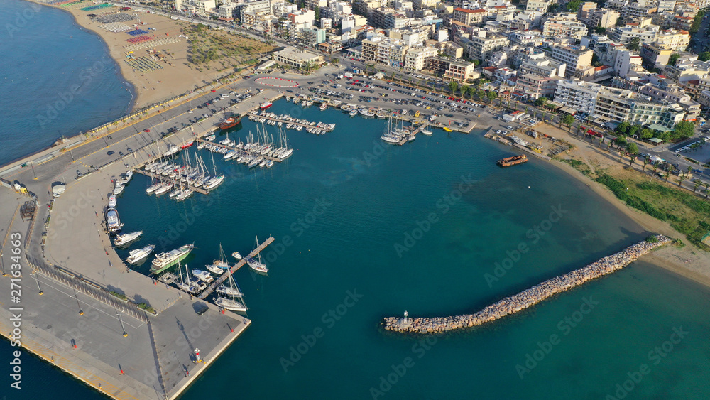 Aerial drone photo of unique old picturesque Venetian port with old lighthouse in the heart of famous city of Rethymno, Crete island, Greece Aerial drone photo of unique old picturesque Venetian port with old lighthouse in the heart of famous city of Rethymno, Crete island, Greece