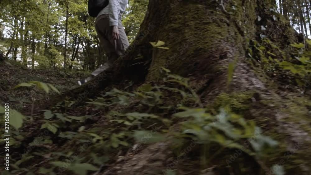 Young woman walking in nature alone Young woman walking in nature alone