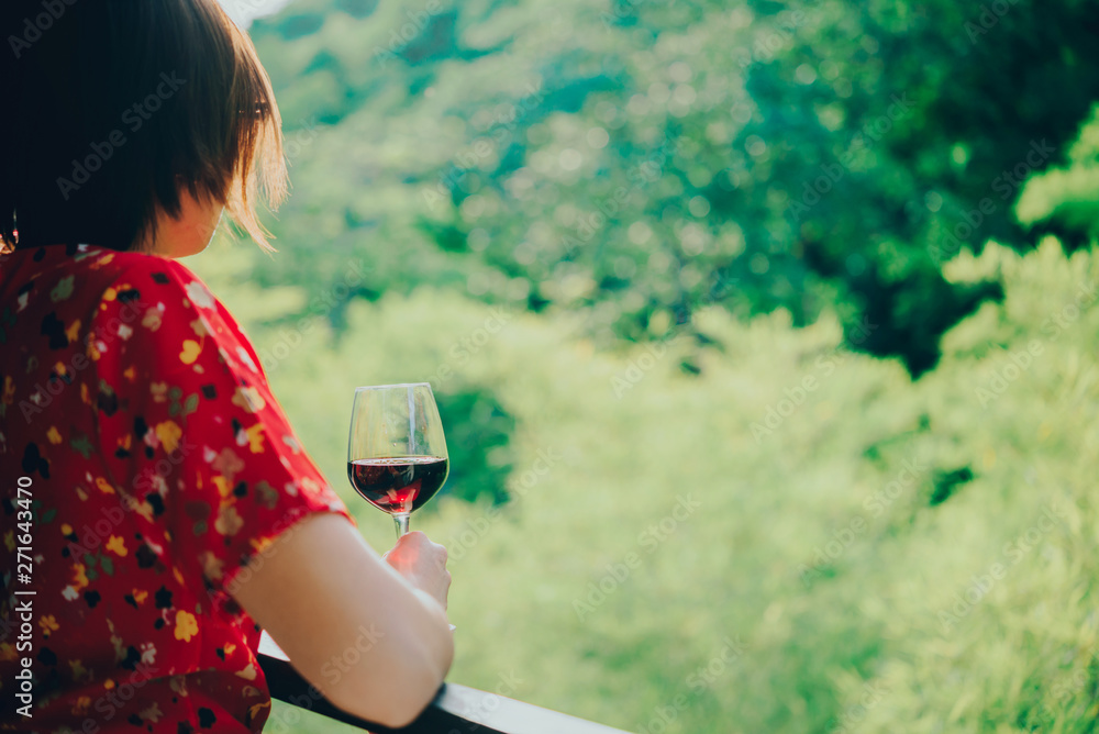 Fototapeta premium Woman with glass of tasty wine,Young Woman drinking wine