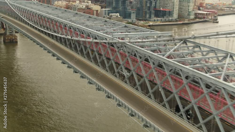 Aerial, cars travel across Williamsburg Bridge Aerial, cars travel across Williamsburg Bridge