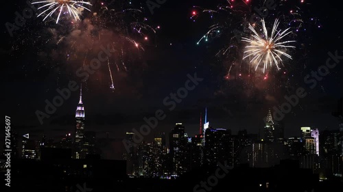 Fireworks over New York City skyline, wide