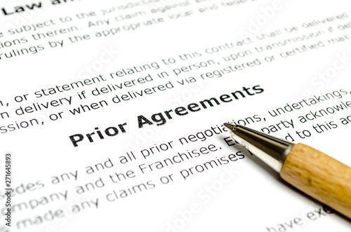 Prior agreements with wooden pen